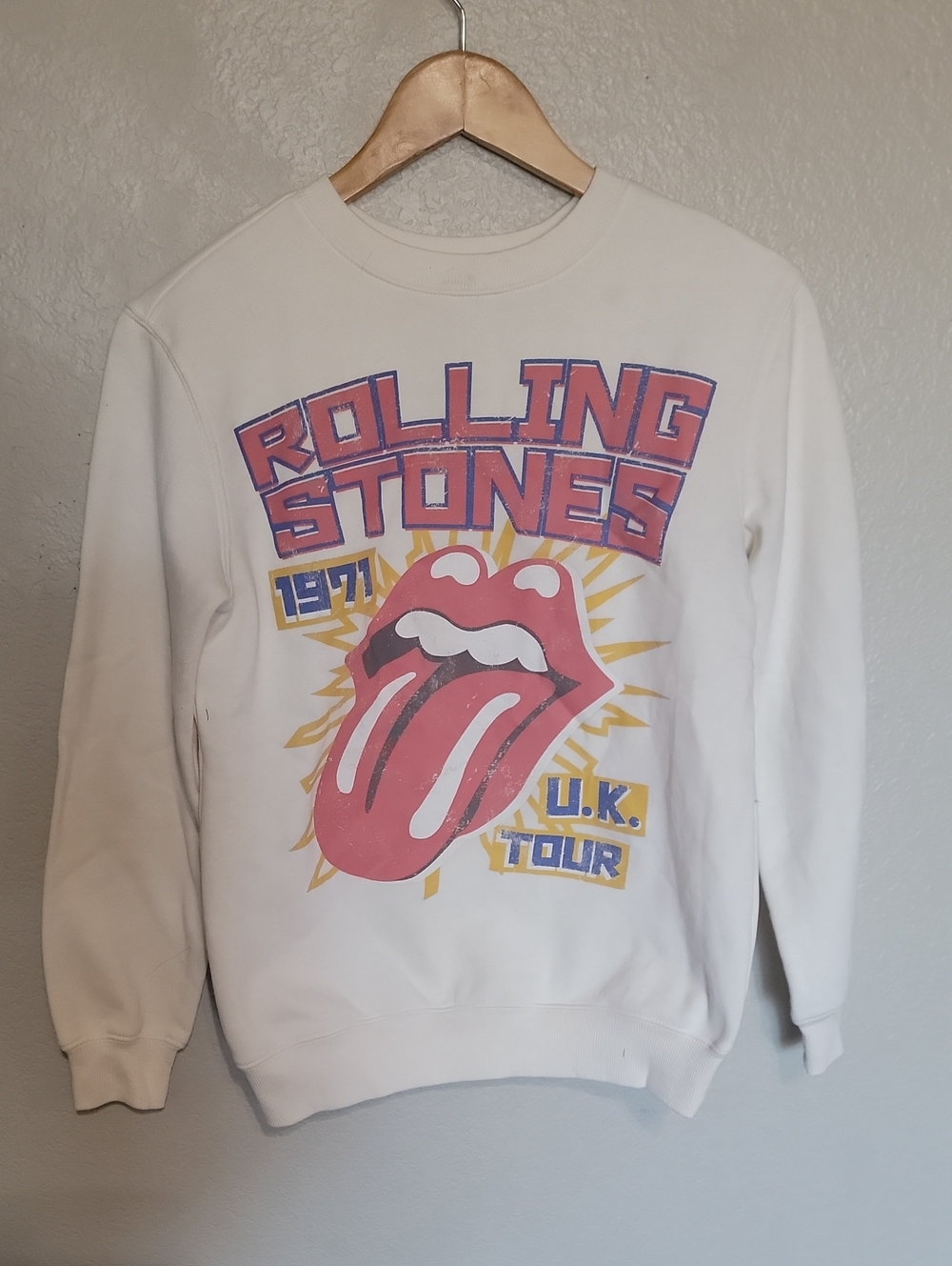the Rolling Stones White Crewneck Sweatshirt with Pink Tongue Graphic